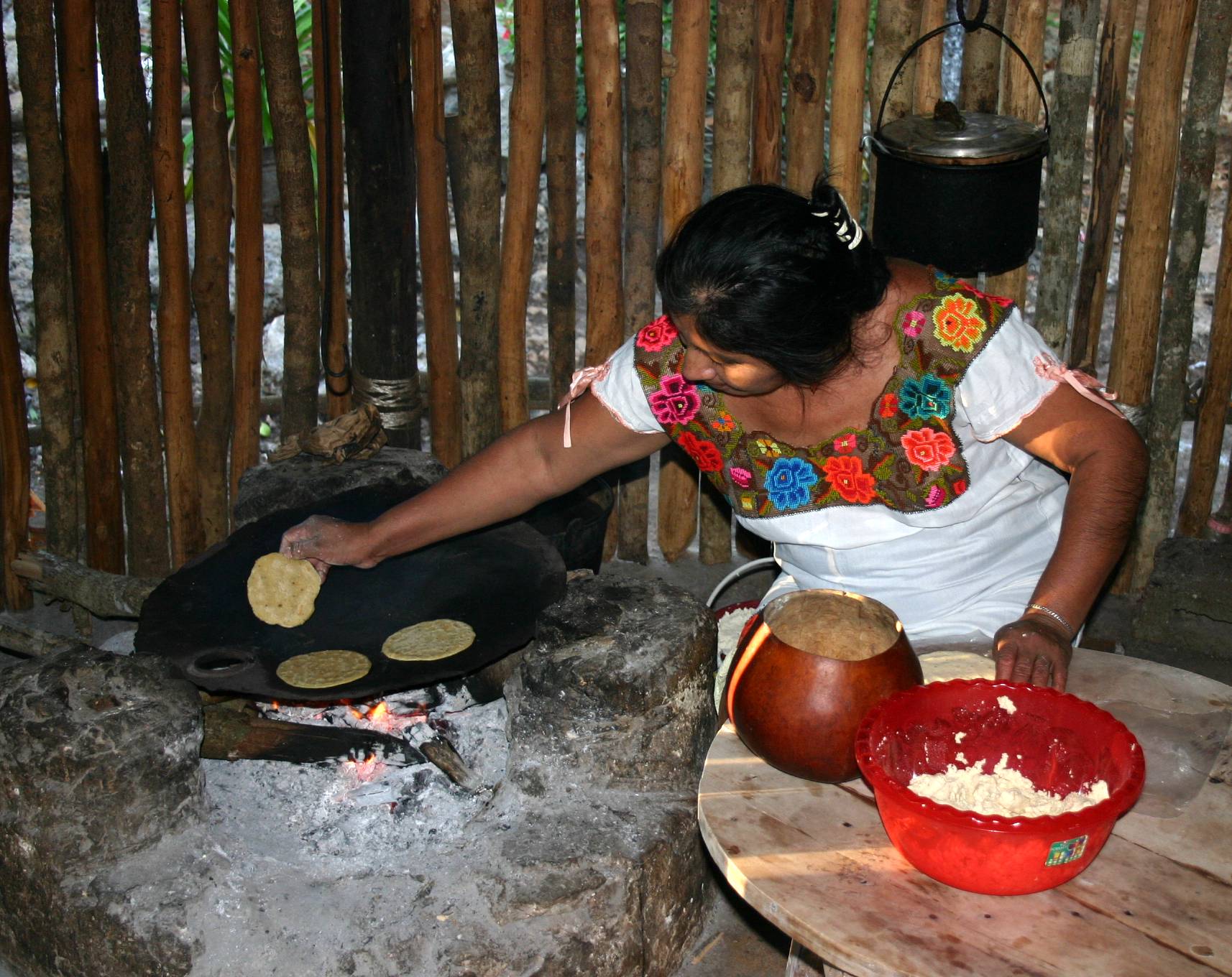 Mexican woman preparing tortillas